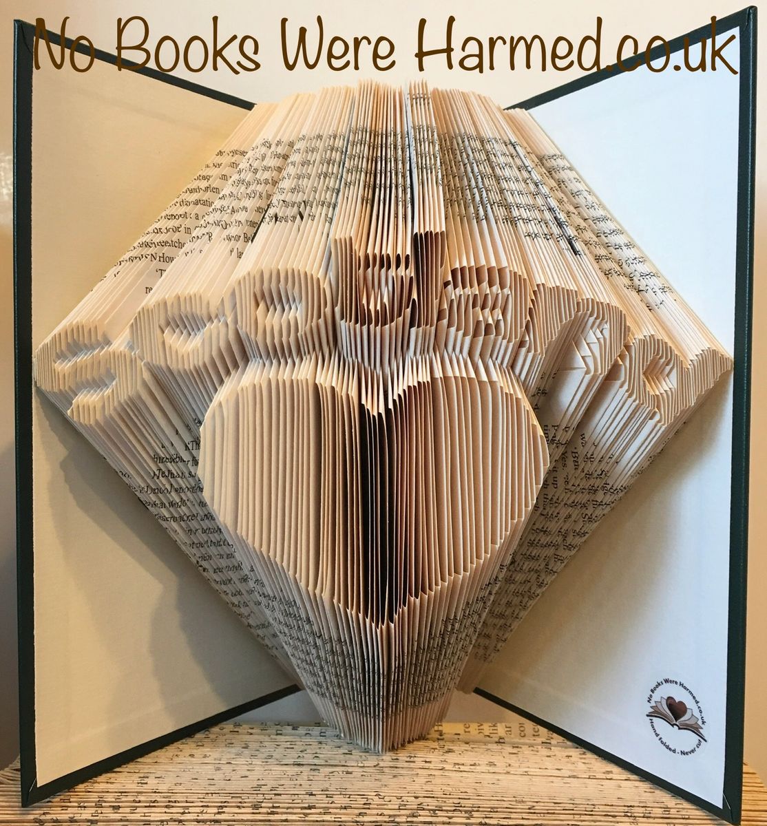 Hand-folded book art featuring the word 'Scotland' over a love heart, crafted from vintage book pages.